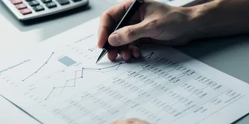 Financial planner analyzing 401(k) contribution limits for 2026